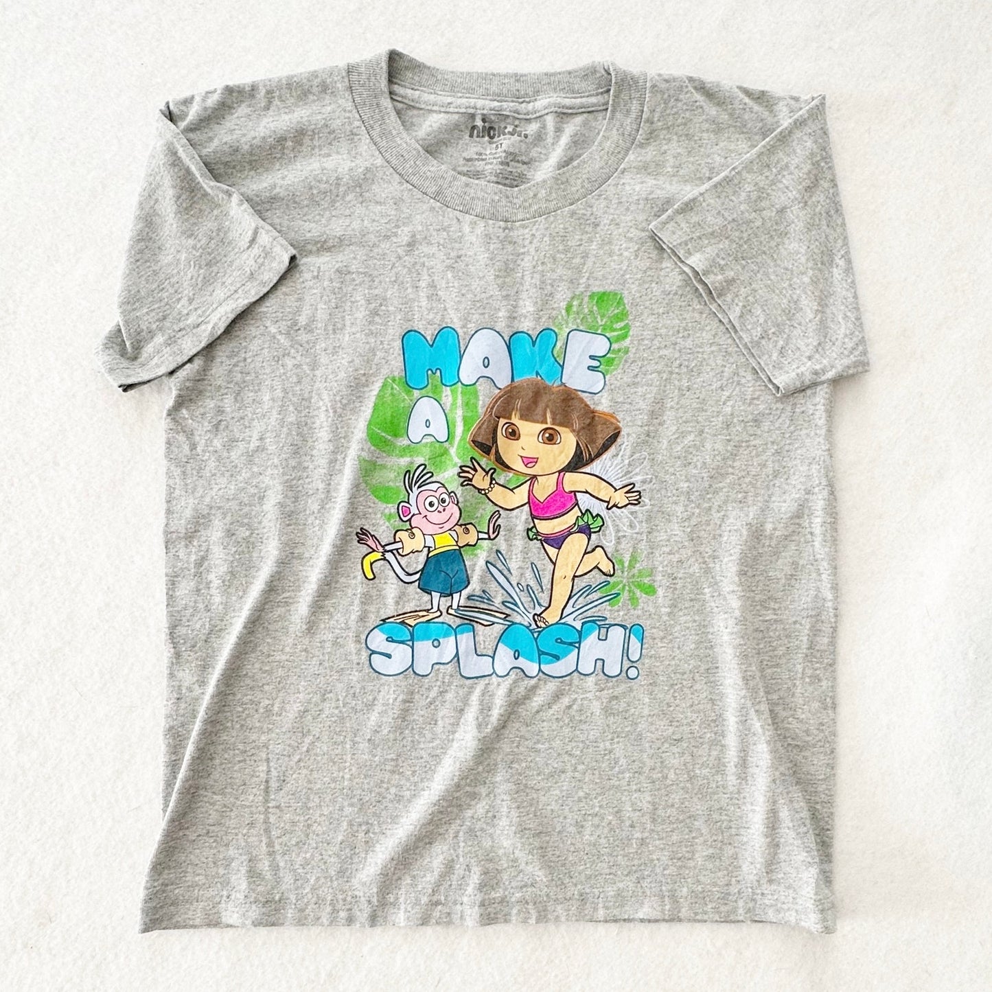 2012 Nick Jr. Dora and Boots Splash Graphic Tee: 8y? - Yellow Clover Vintage Kids Clothes