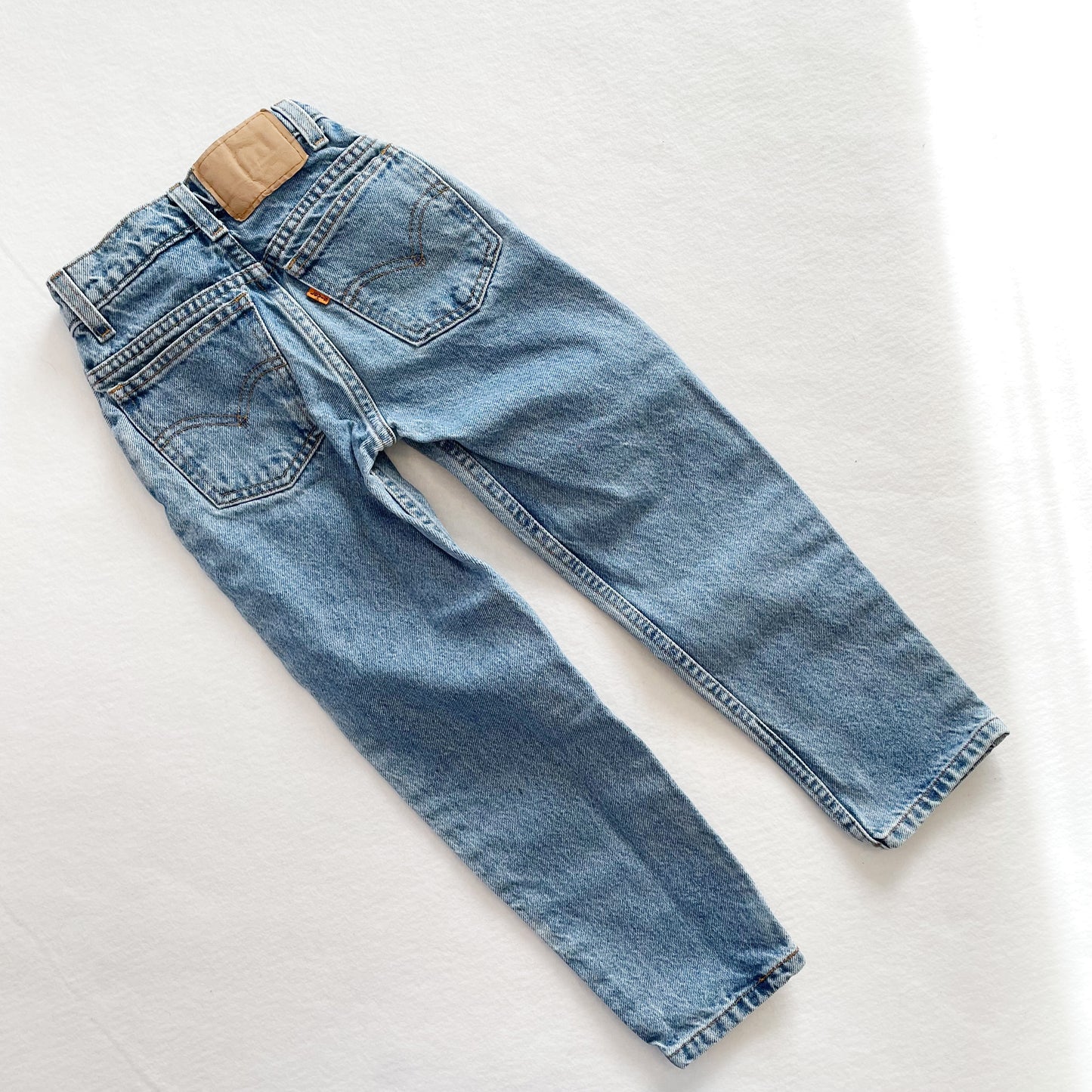 Levi’s Medium Wash 550 Orange Tab Jeans • 7 slim