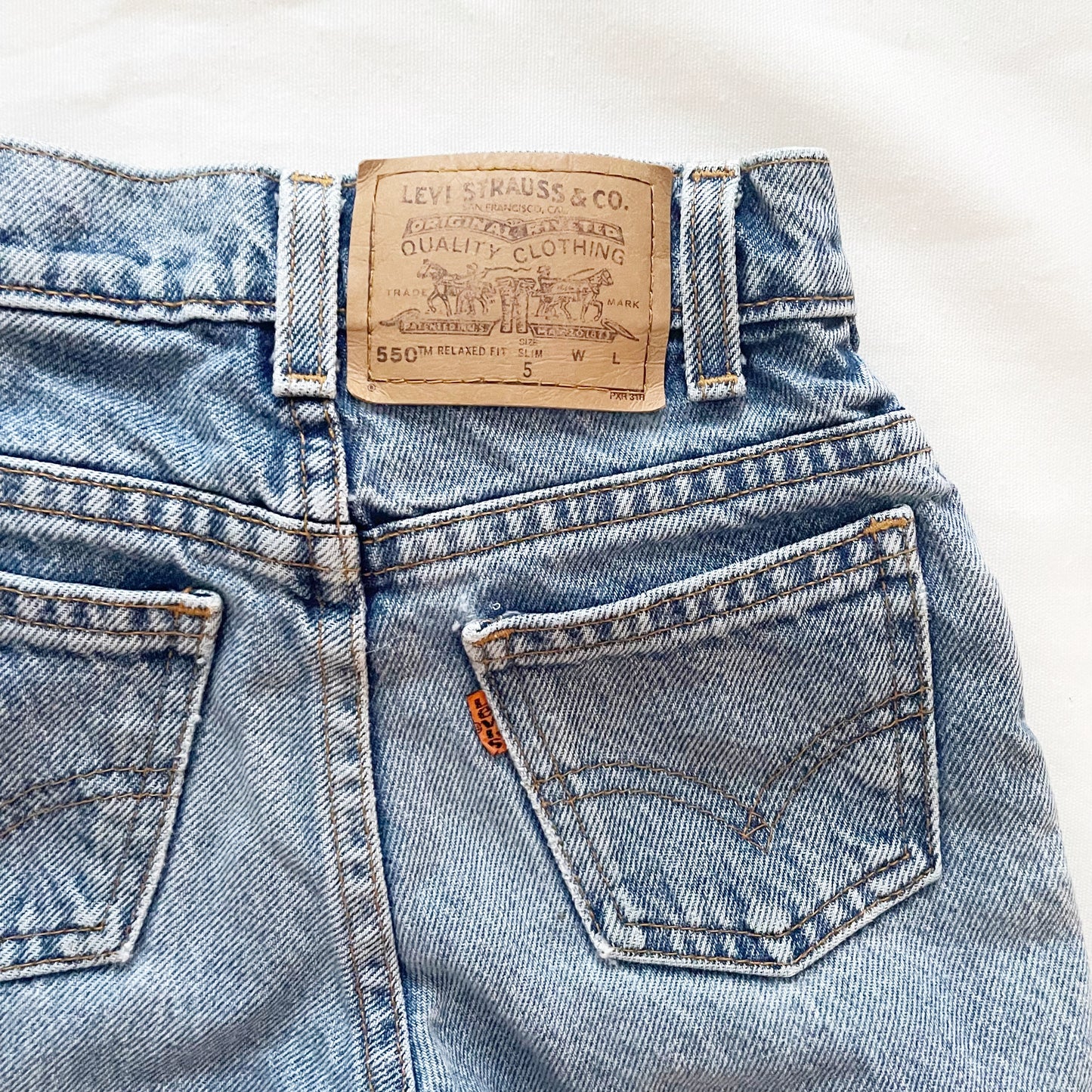 Levi’s 550 Medium-Light Wash Orange Tab Jeans