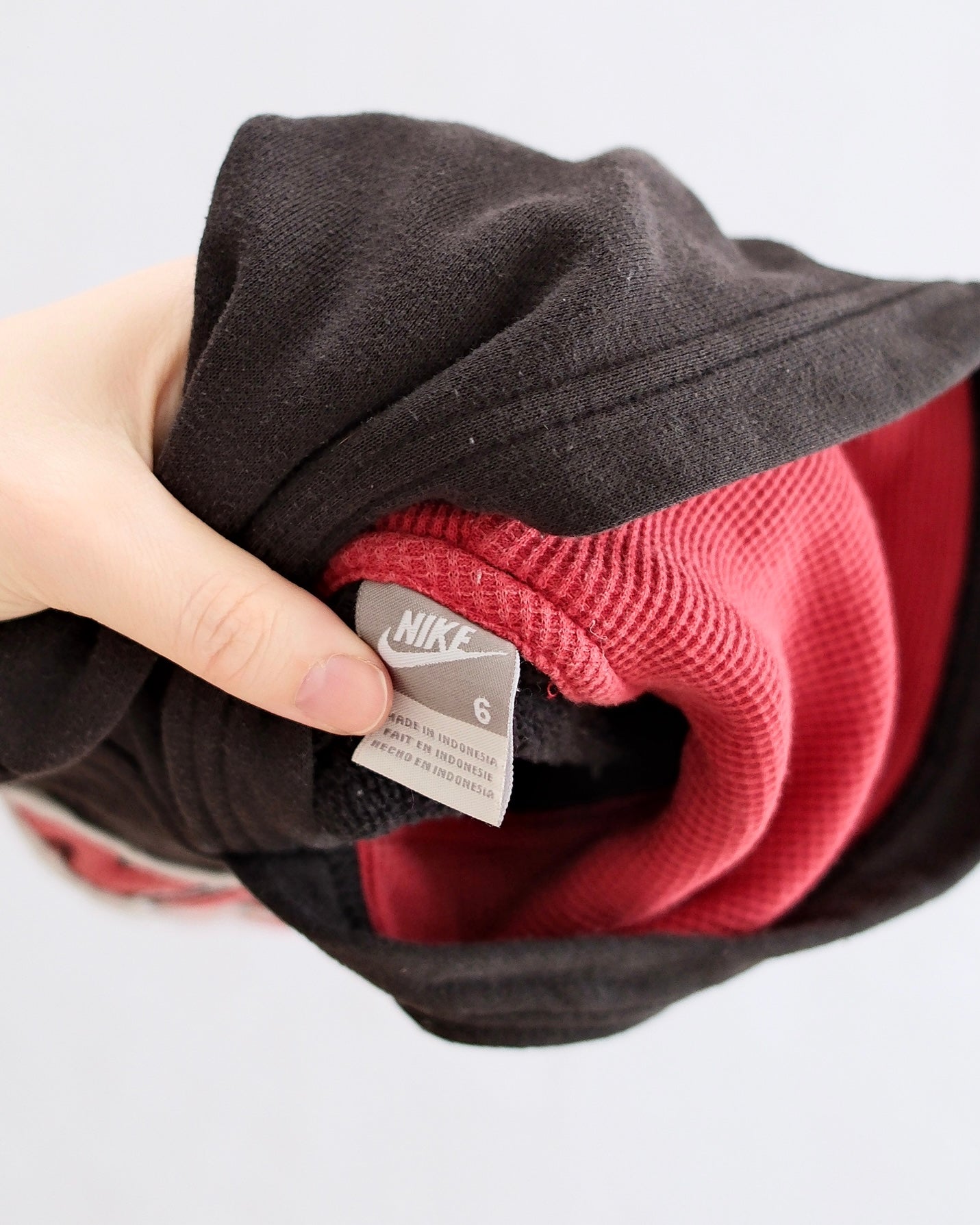 Y2K Nike black and red pullover hoodie with thermal fabric accents