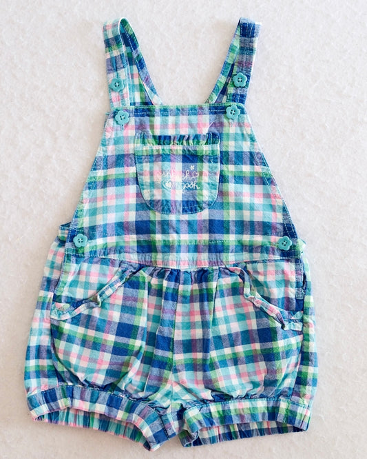 Y2K OshKosh B'Gosh girls blue plaid bubble shortall size 24 months, front flat lay, madras plaid in blue green pink and white, teal flower buttons