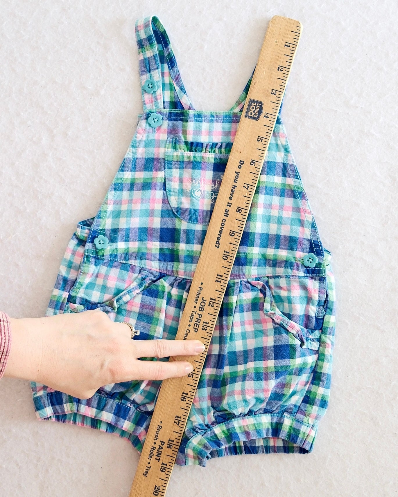 Y2K OshKosh B'Gosh girls blue plaid bubble shortall size 24 months, front flat lay, madras plaid in blue green pink and white, teal flower buttons