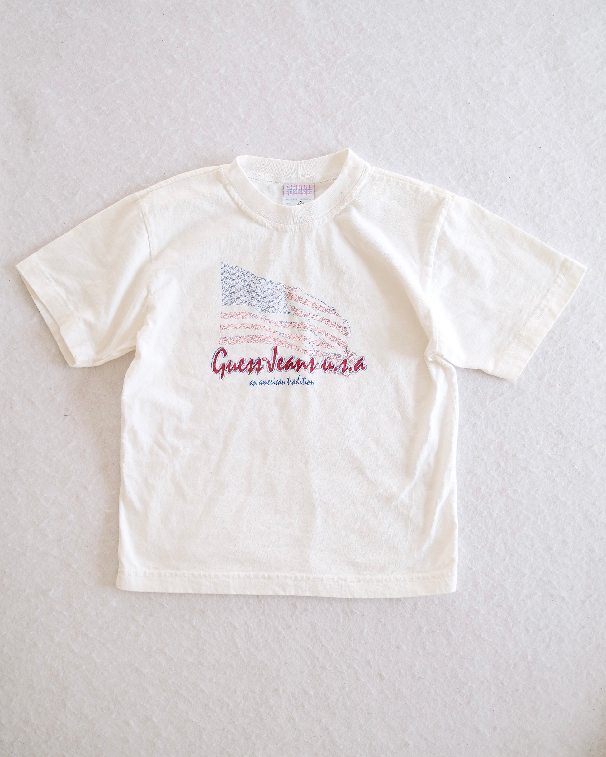 Vintage Guess Jeans U.S.A. American Flag Graphic T-Shirt in White: 6/7y - Yellow Clover Vintage Kids Clothes