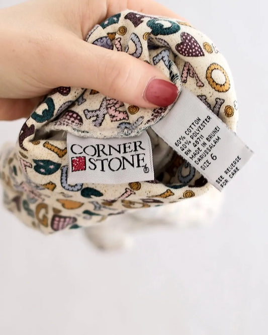 Vintage Corner Stone cream alphabet heart print turtleneck